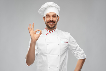 Image showing happy smiling male chef showing ok hand sign