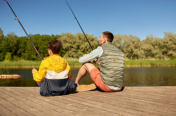 Image showing father and son fishing on river