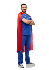 Image showing smiling doctor or male nurse in superhero cape