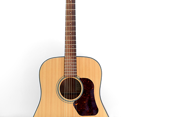 Image showing close up of acoustic guitar on white background