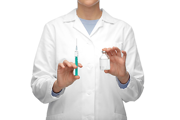 Image showing close up of doctor with medicine and syringe