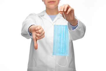 Image showing female doctor with mask showing thumbs down