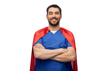 Image showing smiling doctor or male nurse in superhero cape