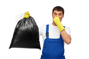 Image showing male worker or cleaner with stinky garbage bag