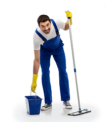 Image showing male cleaner cleaning floor with mop and bucket