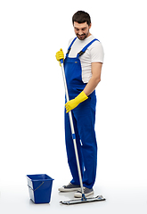 Image showing male cleaner cleaning floor with mop and bucket