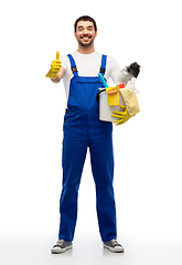 Image showing cleaner with cleaning supplies showing thumbs up