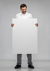 Image showing happy smiling male chef with big white board