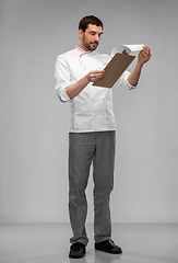 Image showing male chef with clipboard