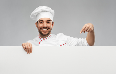 Image showing happy smiling male chef with big white board