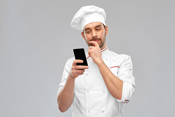 Image showing male chef with smartphone