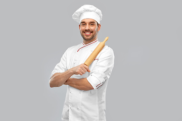 Image showing happy smiling male chef or baker with rolling pin