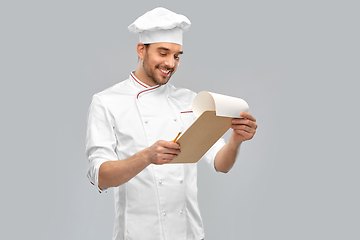Image showing happy smiling male chef with clipboard