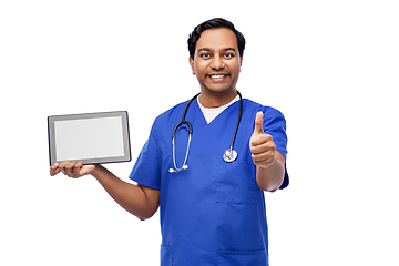 Image showing male doctor with tablet pc showing thumbs up