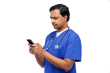 Image showing indian doctor or male nurse using smartphone