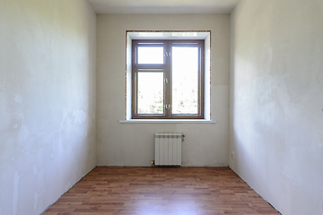 Image showing View of the window in a small room, the room has a laminate