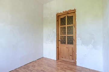 Image showing View of the front door in a small room after renovation