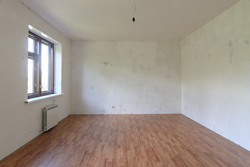 Image showing Interior of a small empty room with one window during renovation