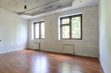 Image showing Empty room interior, wall view with windows