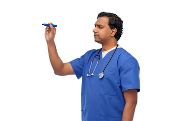 Image showing indian male doctor writing something with marker