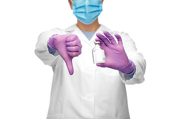 Image showing close up of doctor with medicine shows thumbs down