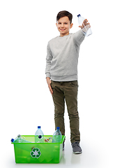 Image showing smiling boy sorting plastic waste