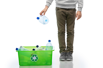 Image showing boy throwing plastic bottle into box