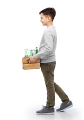 Image showing smiling boy with wooden box sorting glass waste