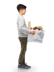 Image showing smiling boy sorting paper waste