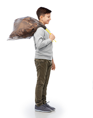 Image showing smiling boy with paper garbage in plastic bag