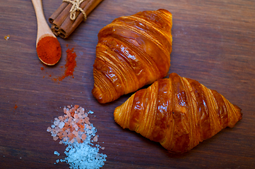 Image showing french traditiona croissant brioche butter bread  on wood