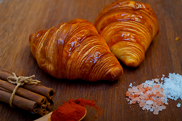 Image showing french traditiona croissant brioche butter bread  on wood