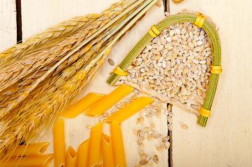 Image showing Italian pasta penne with wheat