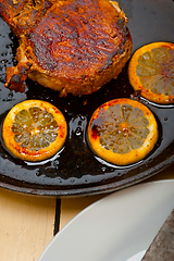 Image showing pork chop seared on iron skillet