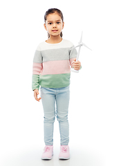 Image showing smiling girl with toy wind turbine