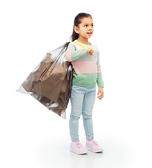 Image showing smiling girl with paper garbage in plastic bag