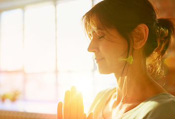 Image showing close up of yogi woman meditating at yoga studio