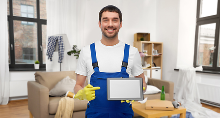 Image showing male worker or cleaner showing tablet pc at home