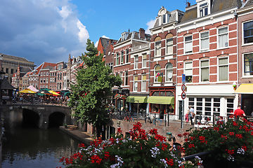 Image showing Amsterdam downtown, Traditional old houses and a canals. Holland