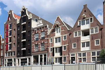 Image showing Amsterdam downtown, Traditional old houses and a canals. Holland