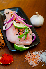 Image showing fresh organic chicken breast with herbs and spices