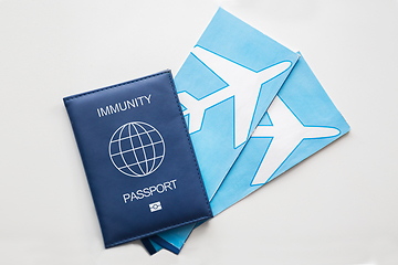 Image showing immunity passport and air tickets for travel