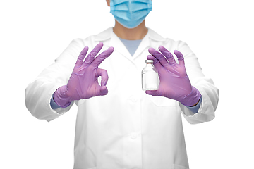 Image showing close up of doctor with medicine showing ok sign