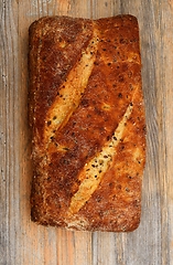 Image showing loaf of bread with seeds 