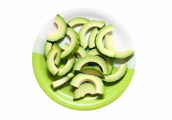 Image showing Avocado cut into slices on a plate