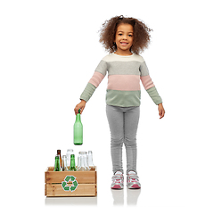 Image showing smiling girl with wooden box sorting glass waste