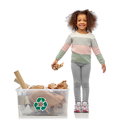 Image showing smiling african american girl sorting paper waste