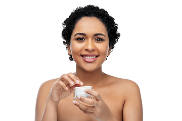 Image showing young african american woman with moisturizer