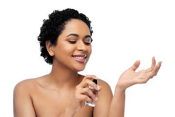 Image showing young african american woman with perfume