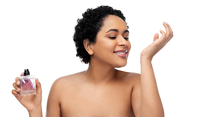 Image showing young african american woman with perfume